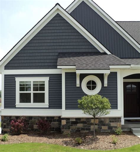 slate blue vinyl siding house.